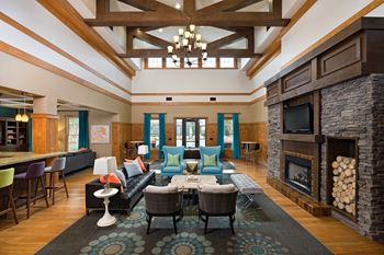 Resident activity center with billiards, media room, and business center